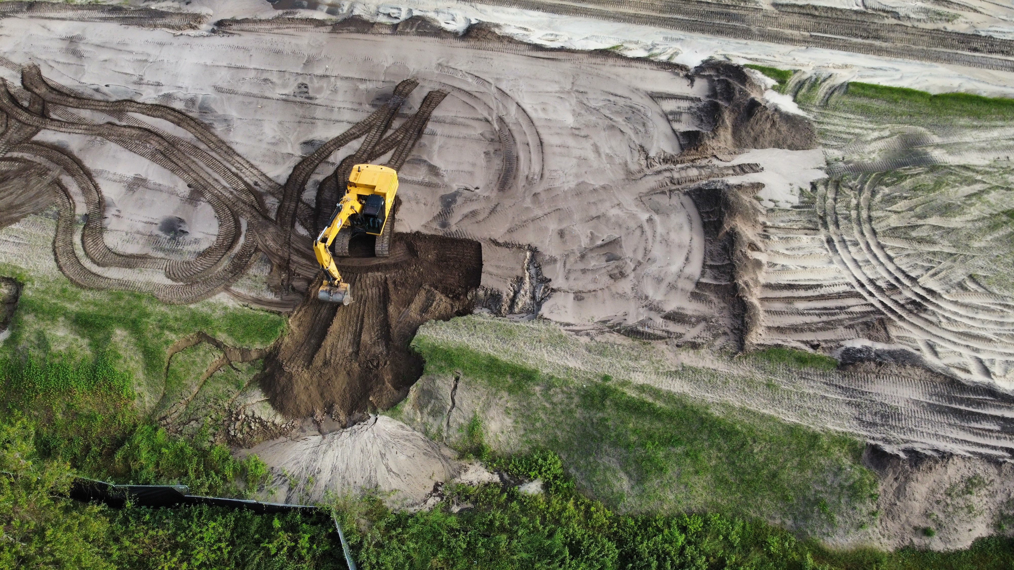 Whisper Valley infrastructure sitework and district-system installation viewed from above